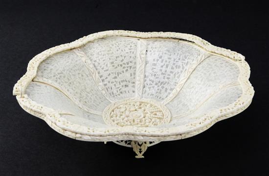 A Chinese export ivory twin handled basket, late 19th century, 21.5cm